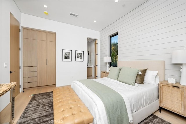 bedroom featuring light hardwood / wood-style flooring