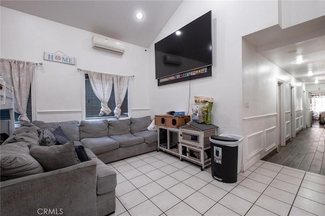 tiled living room featuring vaulted ceiling and a wall mounted air conditioner