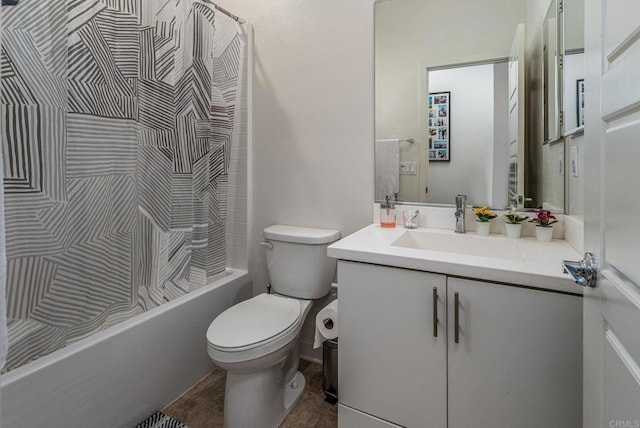 full bathroom featuring tile patterned floors, vanity, toilet, and shower / tub combo