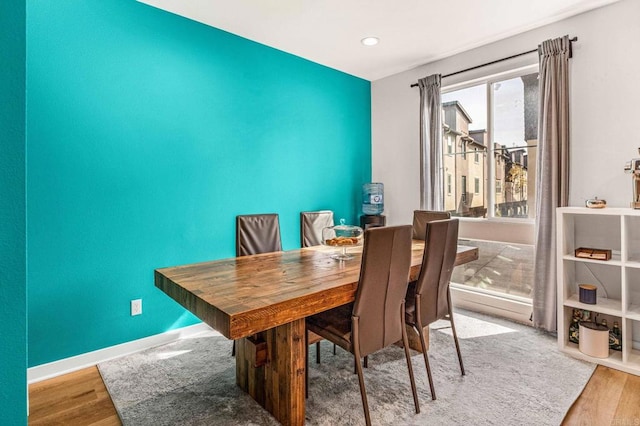 dining area with light hardwood / wood-style flooring