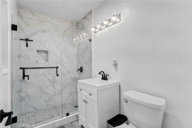 bathroom with a marble finish shower, toilet, and vanity