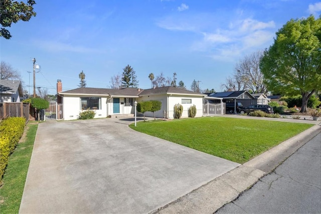 single story home featuring a front yard