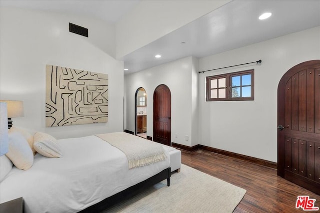 bedroom featuring hardwood / wood-style flooring