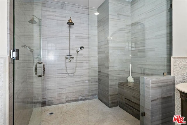 bathroom featuring an enclosed shower