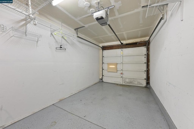 garage featuring a garage door opener