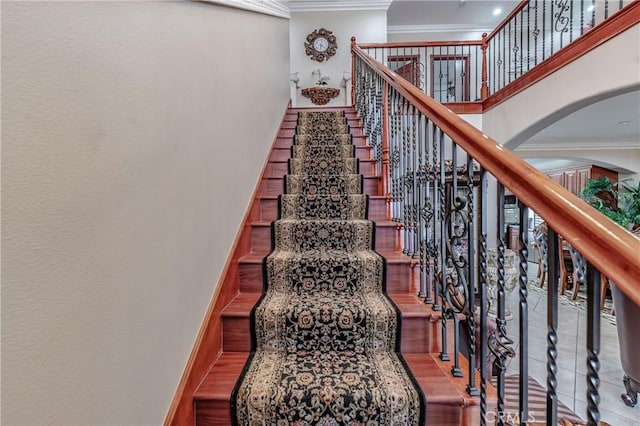 stairs featuring ornamental molding