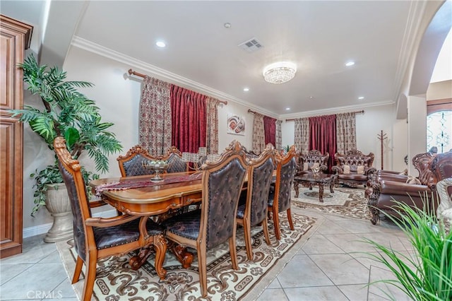 tiled dining room with crown molding