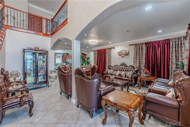 living room featuring crown molding and light tile patterned floors