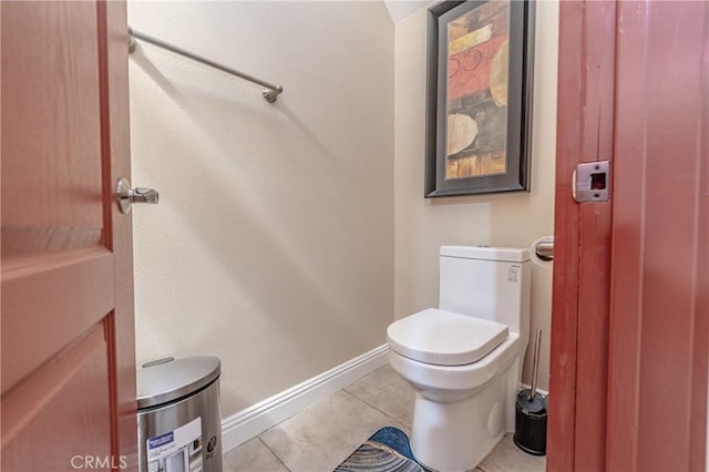 bathroom with tile patterned floors and toilet