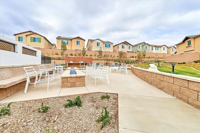 view of patio / terrace with a fire pit