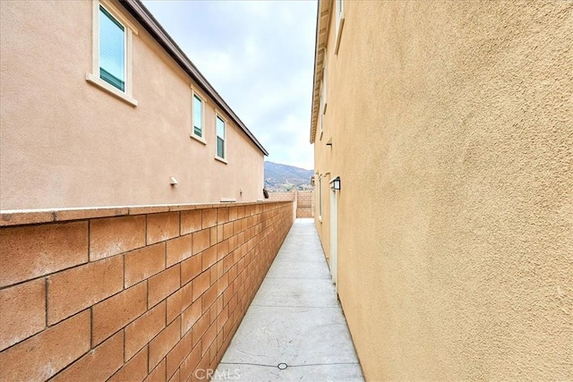 view of side of property featuring a mountain view