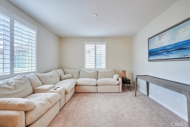 living room with light colored carpet