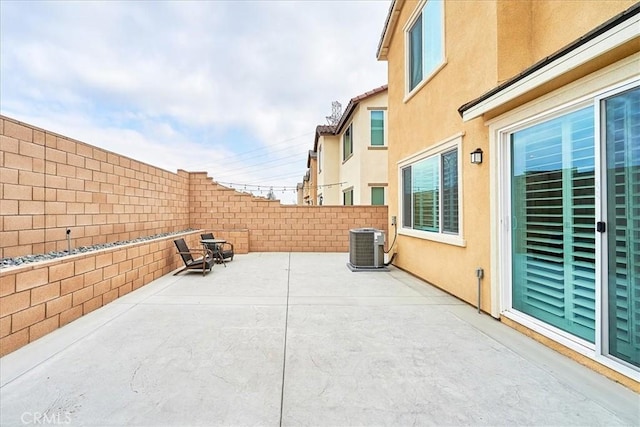 view of patio / terrace with central air condition unit