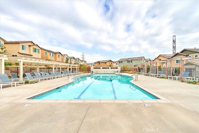 view of swimming pool with a patio area