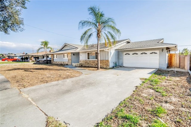 single story home featuring a garage