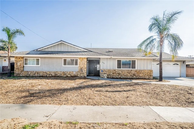 single story home featuring a garage