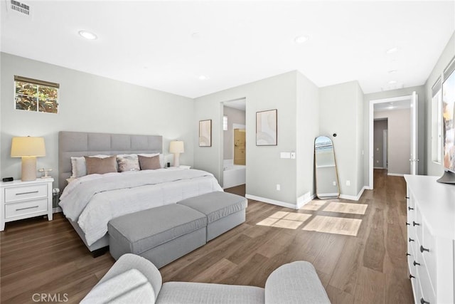 bedroom featuring dark hardwood / wood-style floors