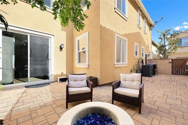 view of patio / terrace with central AC unit