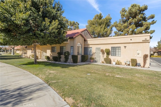 view of front of house with a front yard