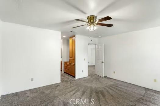 11636 Kerrie Way, Apple Valley, CA 92308 - carpeted empty room featuring ceiling fan