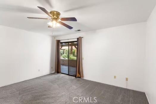 11636 Kerrie Way, Apple Valley, CA 92308 - spare room with carpet floors and a ceiling fan