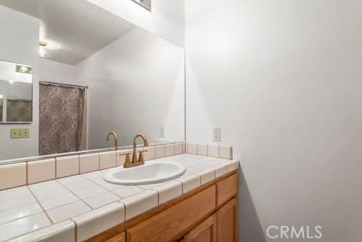 11636 Kerrie Way, Apple Valley, CA 92308 - full bathroom featuring vanity