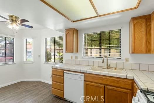 11636 Kerrie Way, Apple Valley, CA 92308 - kitchen featuring dishwasher, a sink, plenty of natural light, and dark wood-type flooring