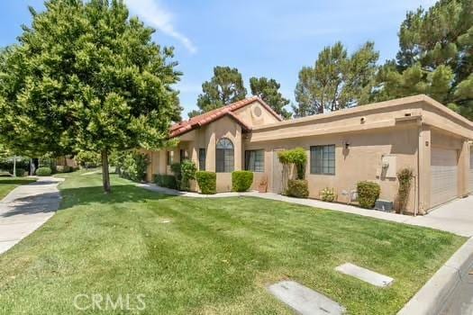 11636 Kerrie Way, Apple Valley, CA 92308 - view of front facade with stucco siding and a front yard