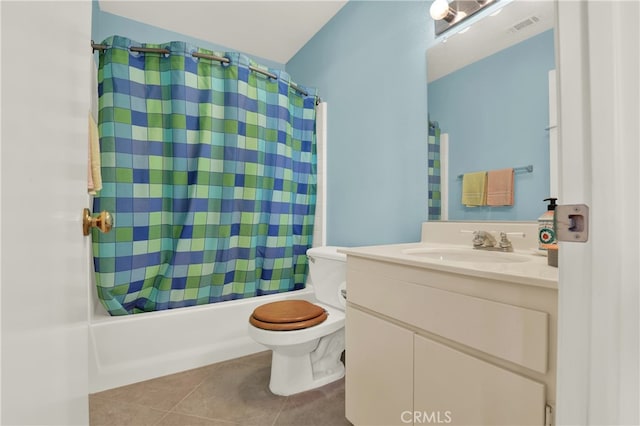 full bathroom with toilet, vanity, tile patterned floors, and shower / bathtub combination with curtain