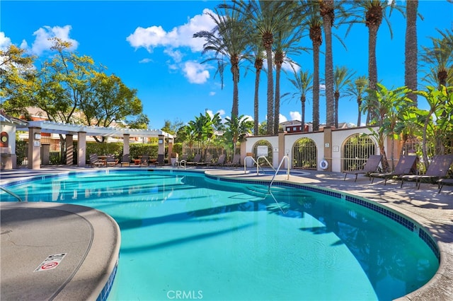 view of pool with a pergola