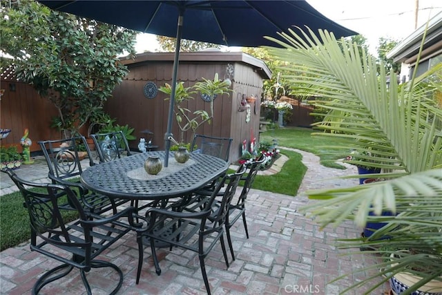 view of patio featuring an outdoor structure