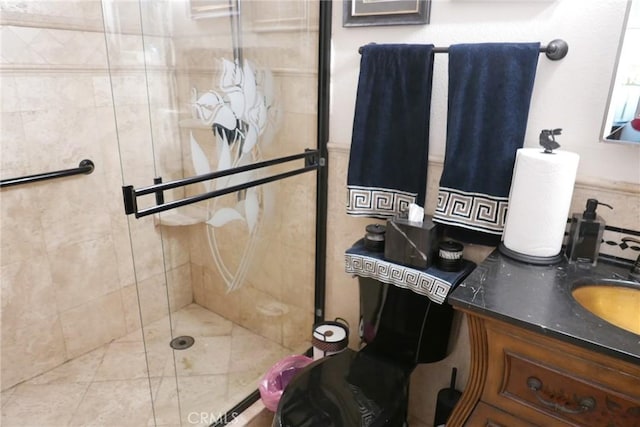 bathroom featuring vanity and walk in shower