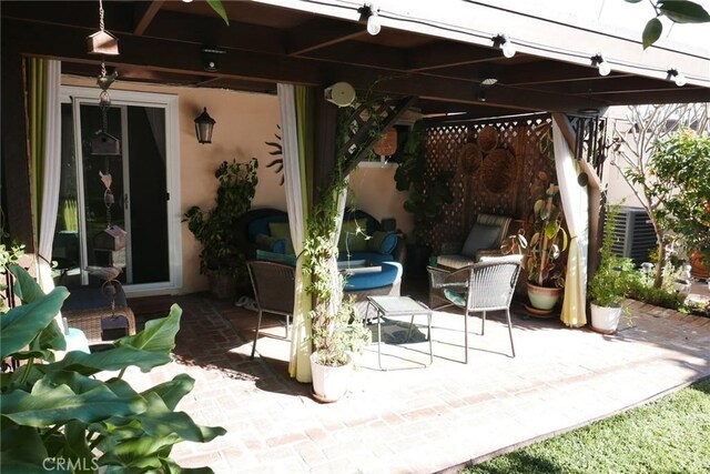 view of patio featuring a pergola