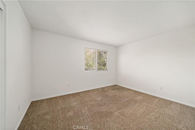 view of carpeted spare room