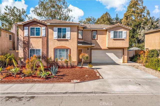 view of front of property with a garage