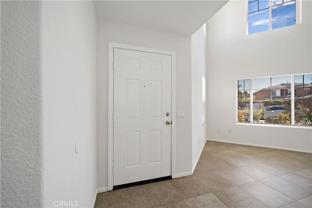 view of tiled foyer entrance