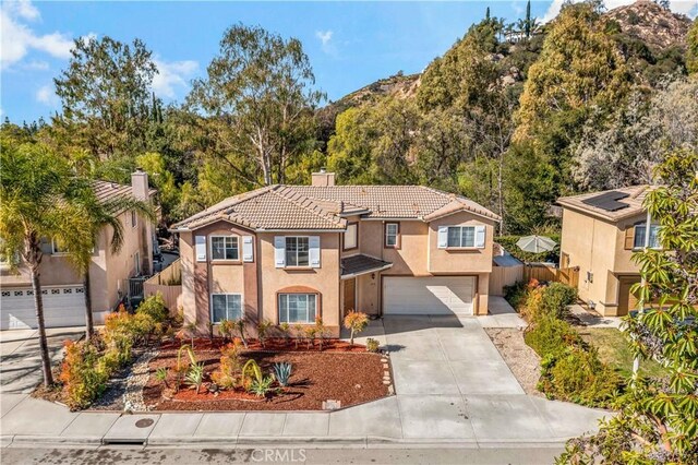 view of front of property with a garage