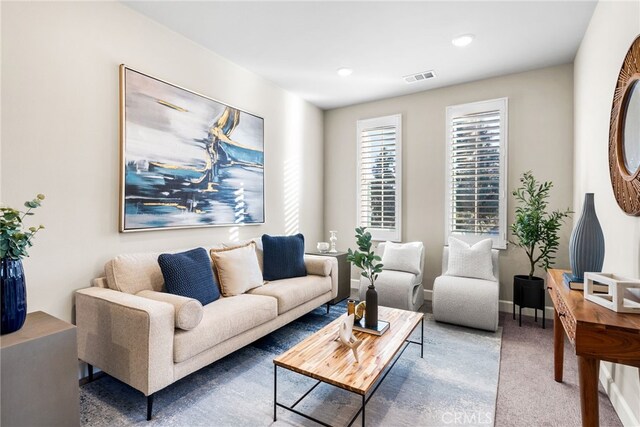 living room featuring carpet floors