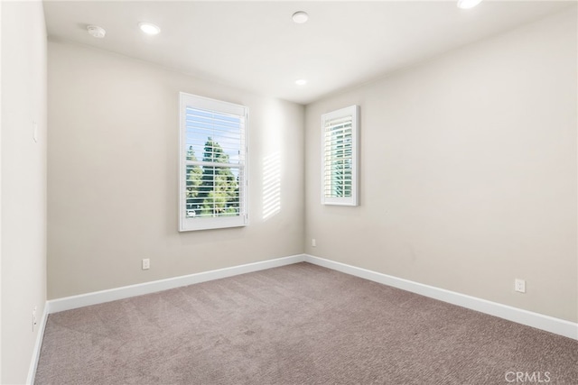 view of carpeted spare room