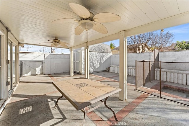 view of patio with ceiling fan