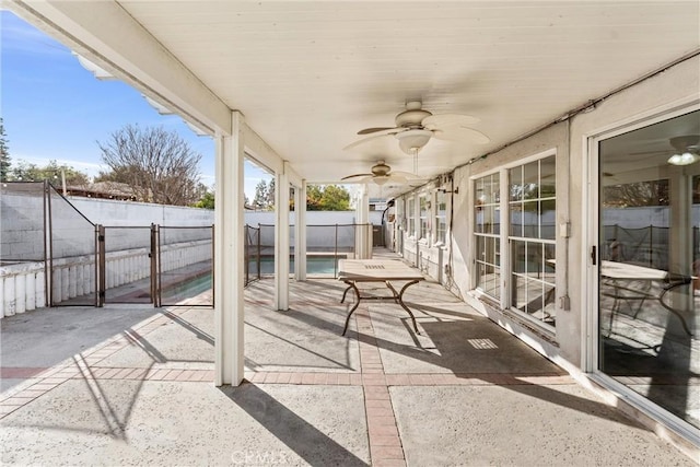 view of patio / terrace featuring ceiling fan