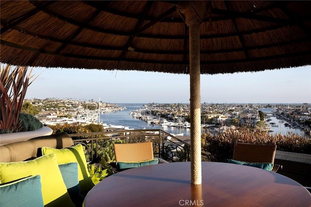 exterior space with outdoor lounge area and a water view