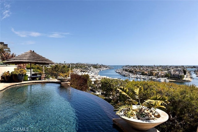 property view of water with a gazebo