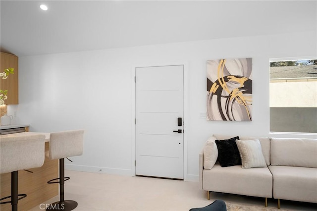 living room with lofted ceiling