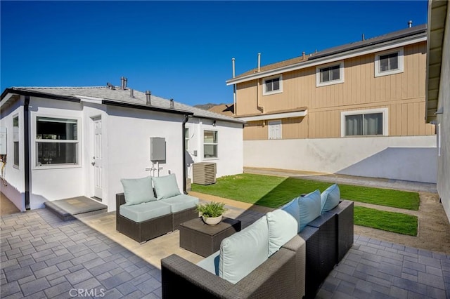 exterior space with a patio area and an outdoor hangout area