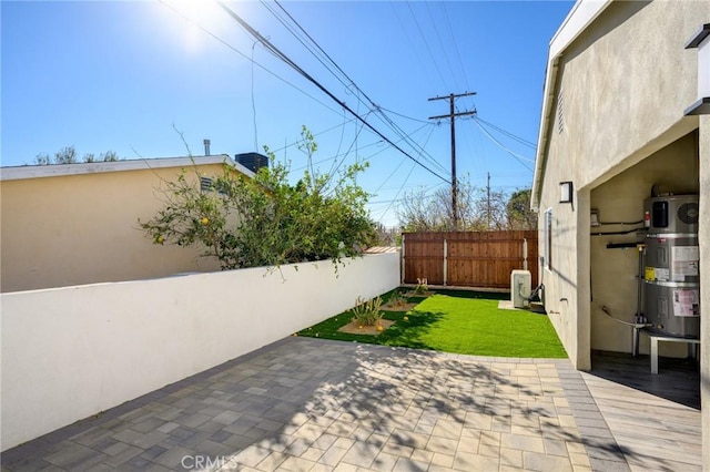 view of patio featuring secured water heater