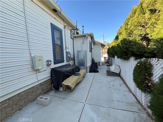 view of home's exterior featuring a patio area