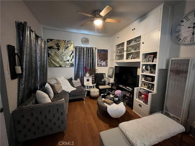 sitting room featuring hardwood / wood-style flooring and ceiling fan