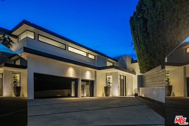 modern home featuring a garage