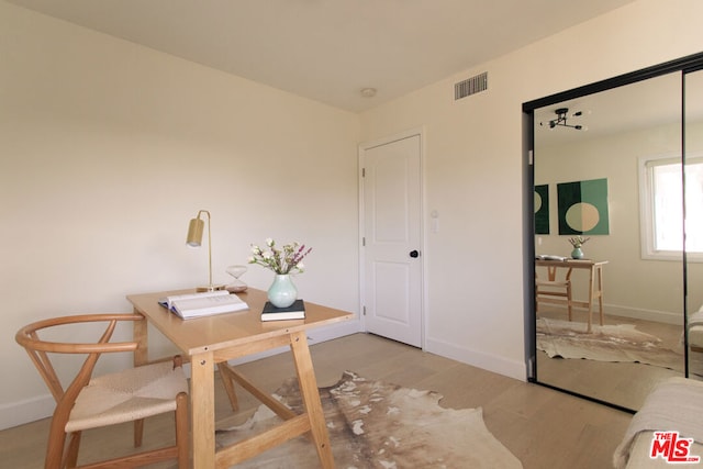 office space featuring light hardwood / wood-style floors